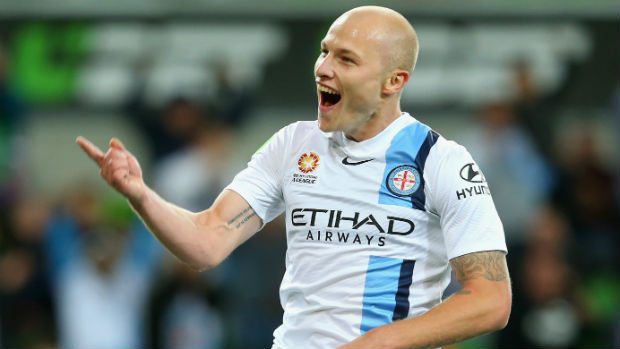Melbourne City midfielder Aaron Mooy has signed with sister club Manchester City.